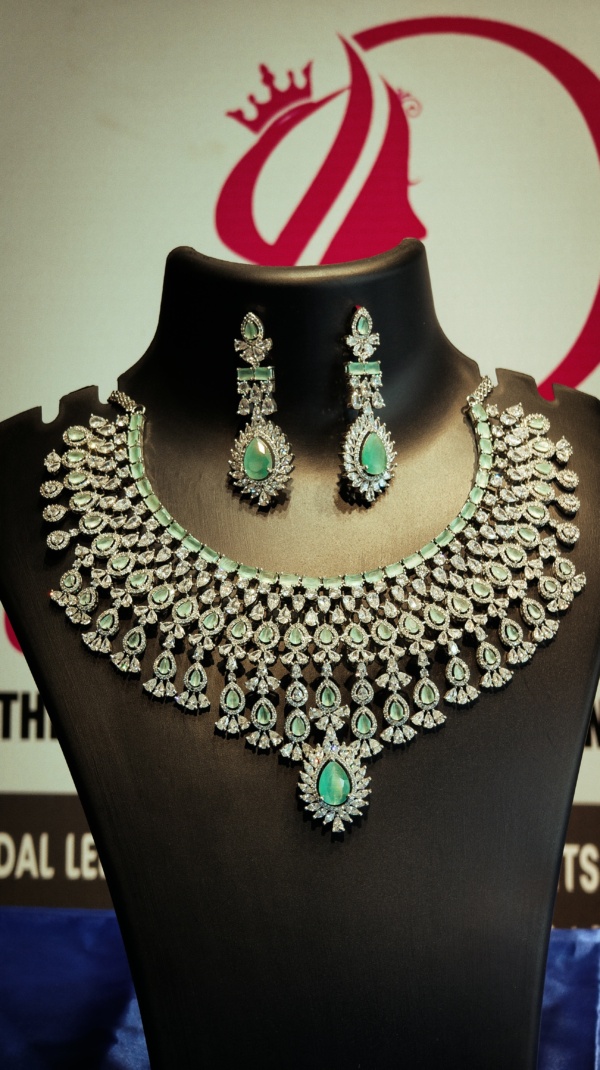 AD Necklace heavy white & pista green stone